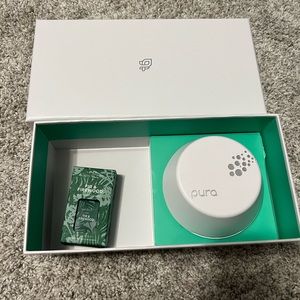 NIB pura diffuser with capri blue fir and firewood